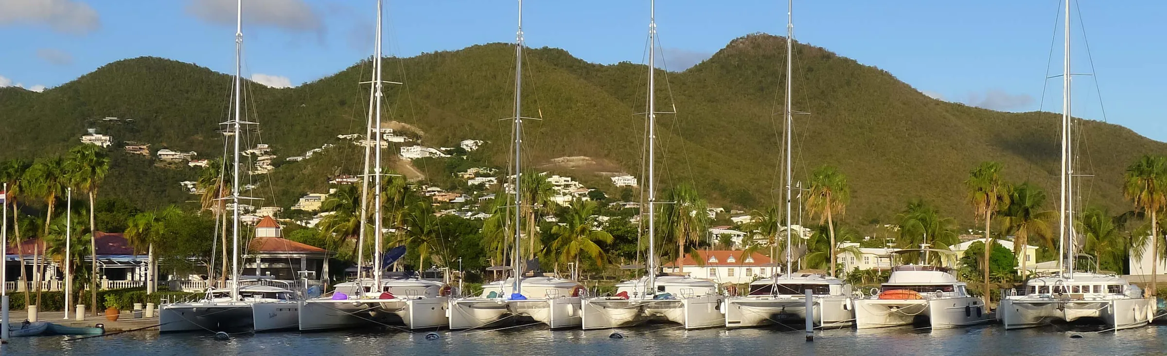 Sailing catamarans moored stern-to at Port de Plaisance marina, Sint Maarten