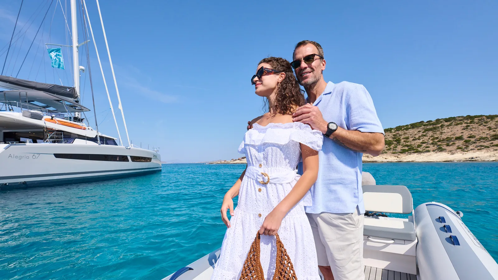 Charter guest couple in the tender, Greece, Fountaine Pajot Alegria 67 Aphaea