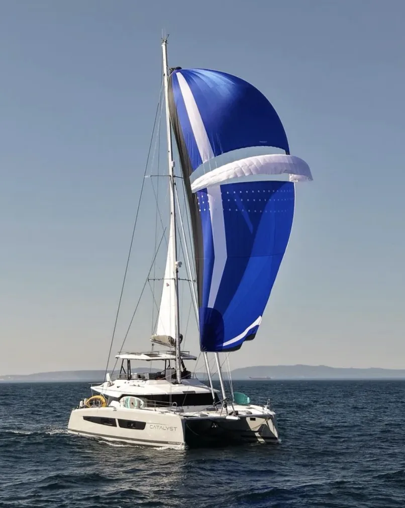 SY Catalyst under her blue Parasailor spinnaker
