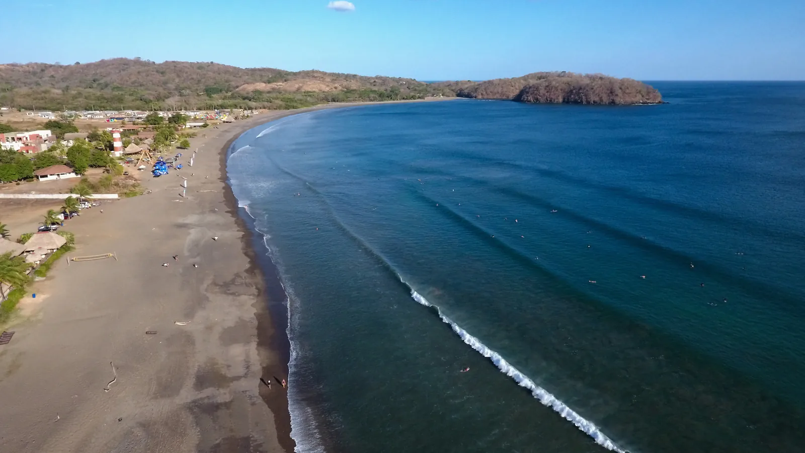 Playa Venao, Panama — the crescent bay and its surf from the air